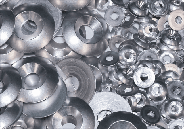 
			A pile of decorative washers designed
			and manufactured by Harper Engineering Co.
		