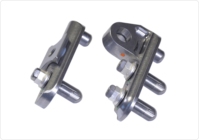 
			Both sides of seat track fittings designed
			and manufactured by Harper Engineering Co.
		