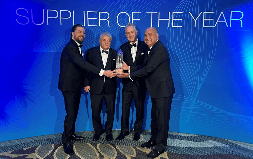           Management of Harper Engineering Co. receiving          Supplier of the Year award at Boeing`s annual event.         