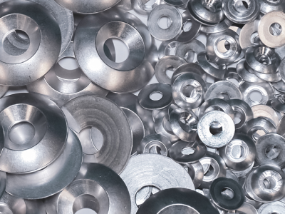 
			A pile of decorative washers designed
			and manufactured by Harper Engineering Co.
		